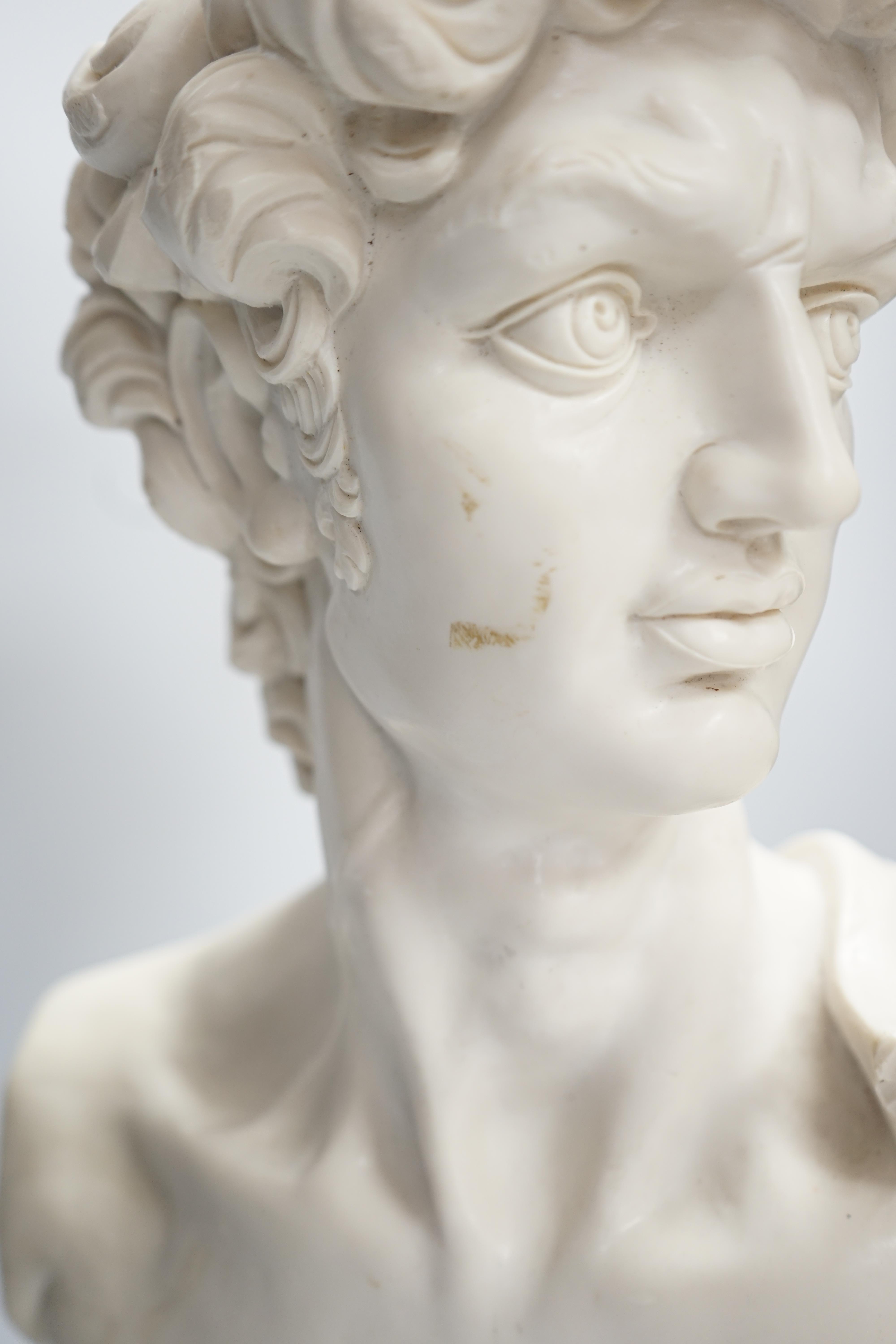 A simulated white marble bust of David, 52cm